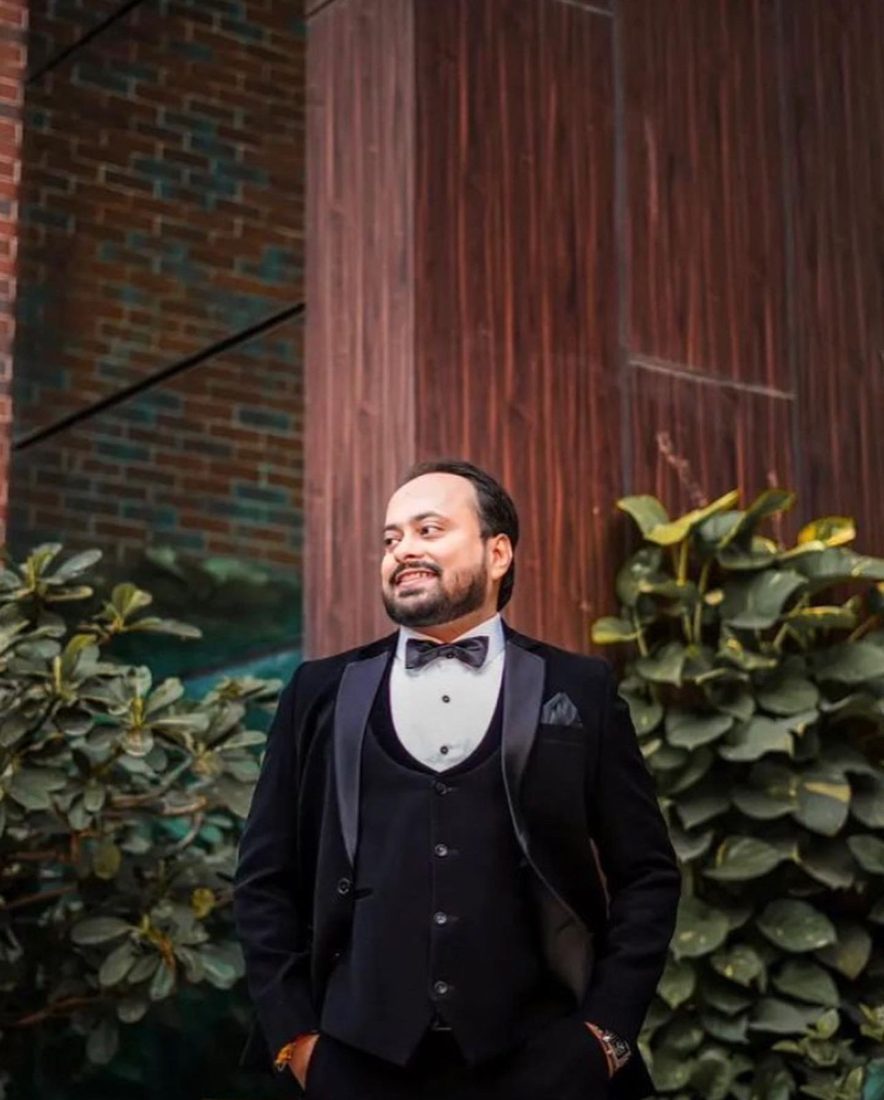 Arpit in a tuxedo outdoors